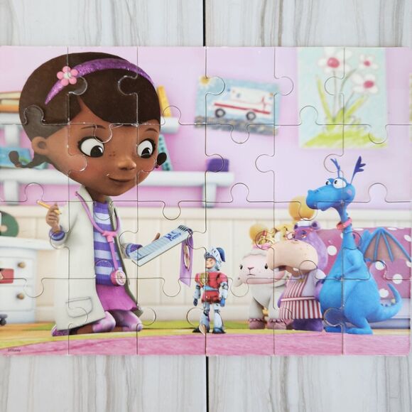 Dora the Explorer & Doc McStuffin's 4 in 1 Wood Puzzles w/ Wood Storage Box - Picture 5 of 8
